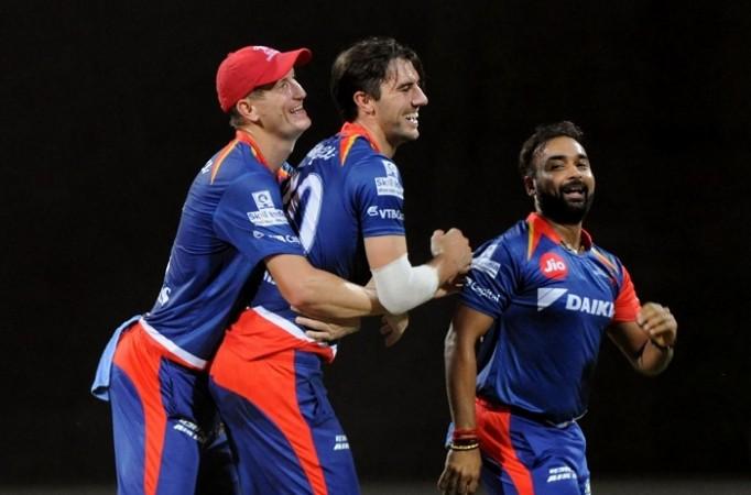 Chris Morris, Pat Cummins and Amit Mishra celebrate the fall of a Mumbai Indians wicket, April 22, 2017 Chris Morris, Pat Cummins, Amit Mishra, Delhi Daredevils, IPL 2017