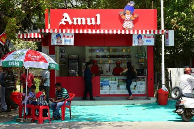 An Amul outlet amul, amul products, GCMMF, milk production in india, milk farmers, milk cooperatives in india, gcmmf sales, ice cream sales in india