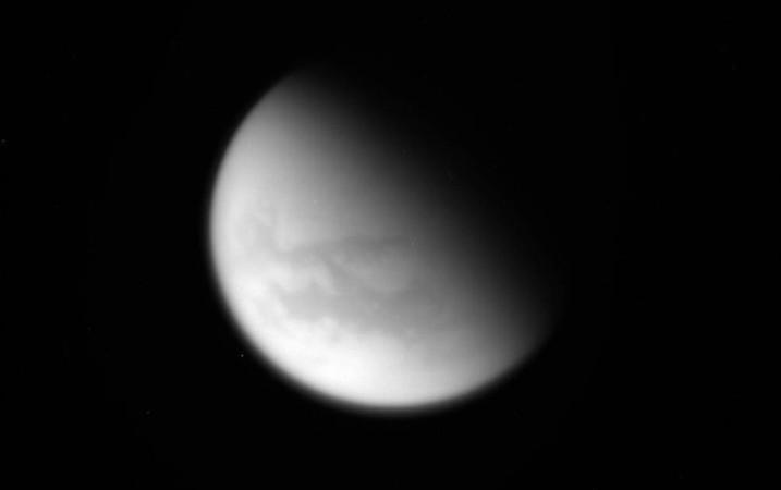This unprocessed image of Saturn's moon Titan was captured by NASA's Cassini spacecraft during its final close flyby of the hazy, planet-sized moon on April 21, 2017. nasa, Cassini, Titan, Saturn, moon, flyby, space,