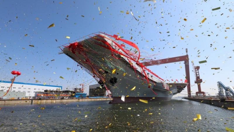 China unveils first home-built aircraft carrier. China unveils first home-built aircraft carrier