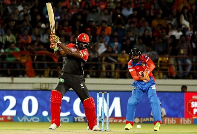 Chris Gayle will want to fire one more time against the Gujarat Lions in IPL 2017 Chris Gayle, RCB, Dinesh Karthik, Gujarat Lions, IPL 2017