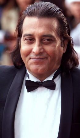 Indian director Vinod Khanna arrives at the Millennium Dome in London for the International Indian Film Awards on June 24. Vinod Khanna
