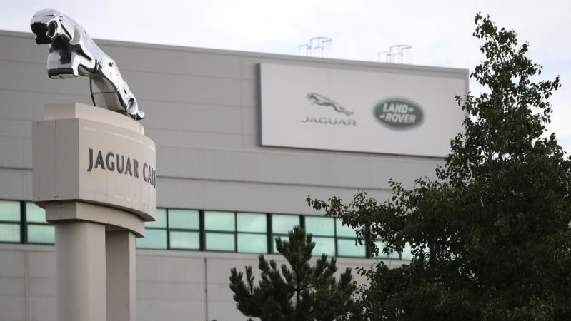 Signs are seen outside the Jaguar Land Rover plant at Halewood in Liverpool, northern England, September 12 , 2016. jlr cars, jaguar cars, land rover cars, new jaguar xf sportbrake, jaguar launch at wimbledon 2017