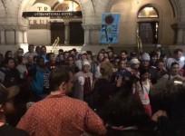 Environmental activists block intersection near Trump hotel in Washington DC