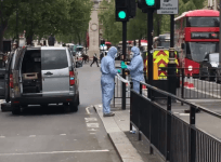 Police inspect bag of knives from Whitehall suspect