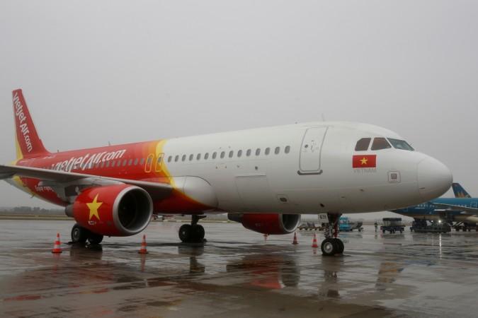 An airplane of Vietjet Air is seen before a flight at Noi Bai airport in Hanoi, Vietnam, December 15, 2016. bikini airline vietjet, vietjet services, vietjet stewardesses, vietjet bikini dance, vietjet ipo, vietjet ceo CEO Nguyen Thi Phuong Thao