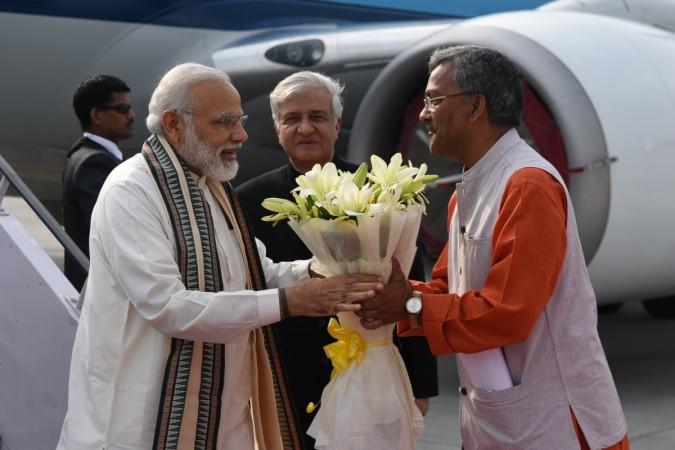 Uttarakhand Governor Shri KK Paul and other dignitaries welcomed the Prime Minister to the state. Uttarakhand Governor Shri KK Paul and other dignitaries welcomed the Prime Minister to the state.