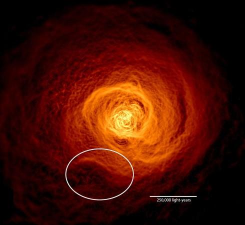 This X-ray image of the hot gas in the Perseus galaxy cluster was made from 16 days of Chandra observations. An oval highlights the location of an enormous wave found to be rolling through the gas. nasa, Chandra observations, Perseus, galaxy, space,