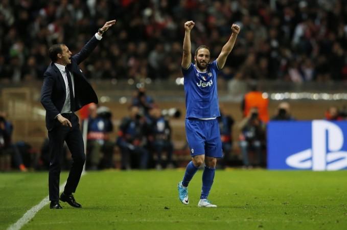 As Gonzalo Higuain celebrates his goal, Massimiliano Allegri makes sure the Juventus defence remains rock-solid, May 4, 2017 Gonzalo Higuain, Massimiliano Allegri, Juventus, Monaco, Champions League