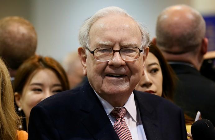 Berkshire Hathaway CEO Warren Buffett visits the BNSF booth before the Berkshire Hathaway annual meeting in Omaha, Nebraska, U.S. May 6, 2017. Warren Buffett, Berkshire Hathaway, american companies, billionaires, forbes list, rich persons, us stock markets, wealth creators, wealthy individuals