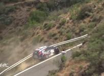 Rally car skids off-track by a sheer drop but driver miraculously survives