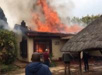 South Africa protests turn violent as white farmers accused of killing black teen are bailed