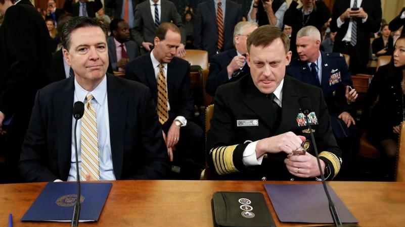 FBI Director James Comey, left, and National Security Agency Director Mike Rogers James Comey