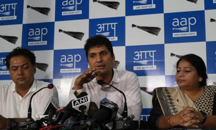 AAP MLA Saurabh Bhardwaj (middle) addresses the media in New Delhi. Saurabh Bhardwaj AAP