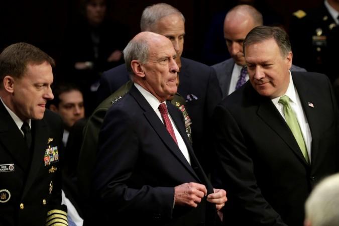 (L-R) NSA Director Adm Mike Rogers, Director of National Intelligence Daniel Coats and CIA Director Mike Pompeo arrive to testify before a Senate Intelligence Committee hearing on Capitol Hill in Washington, May 11, 2017. Daniel Coats