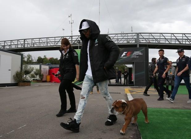 Lewis Hamilton and his dog. 2017 Spanish Grand Prix, Formula One 2017, Formula One practice session, Valtteri Bottas, Lewis Hamilton, Sebastian Vettel, Max Verstappen, Spanish Grand Prix 2017 live streaming, Spanish Grand Prix practice session live