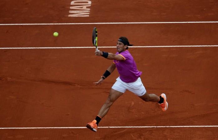 Rafael Nadal playing a shot at the ongoing Madrid Open. Rafael Nadal, David Goffin, Madrid Open 2017, Madrid Open quarterfinals
