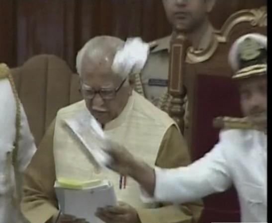 UP Governor Ram Naik tries to deliver an address to a joint session of the state legislature on Monday, May 15, 2017. UP Governor Ram Naik