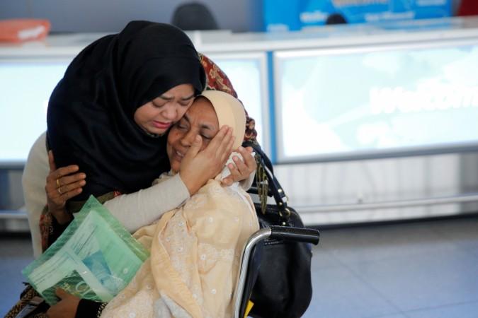 Daughter greets mother at airport Daughter greets mother at airport