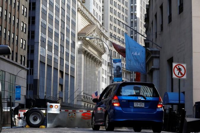 A car waits to enter the financial district security zone near the New York Stock Exchange (NYSE) in New York City, U.S., March 23, 2017. us, tax cut, us tax rates,donald trump, trump tax plan