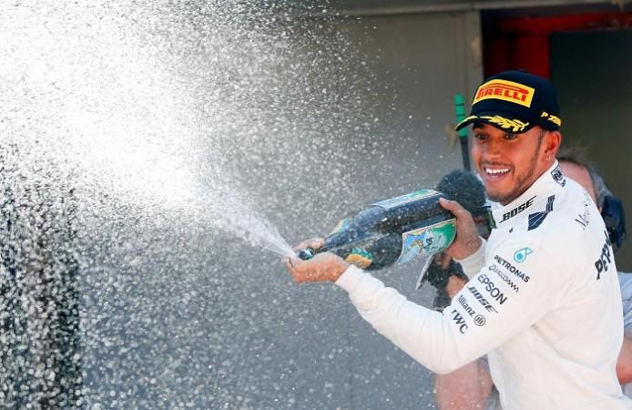 Lewis Hamilton, Lewis Hamilton drinks bottle, Sebastian Vettel, Mercedes Formula One, Toto Wolff, Nico Rosberg, Formula One