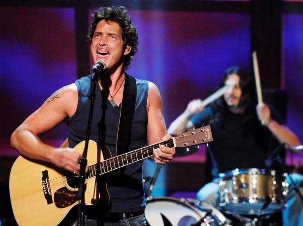 FILE PHOTO: Chris Cornell (L) and Brad Wilk of music group Audioslave perform live during the Chris Cornell