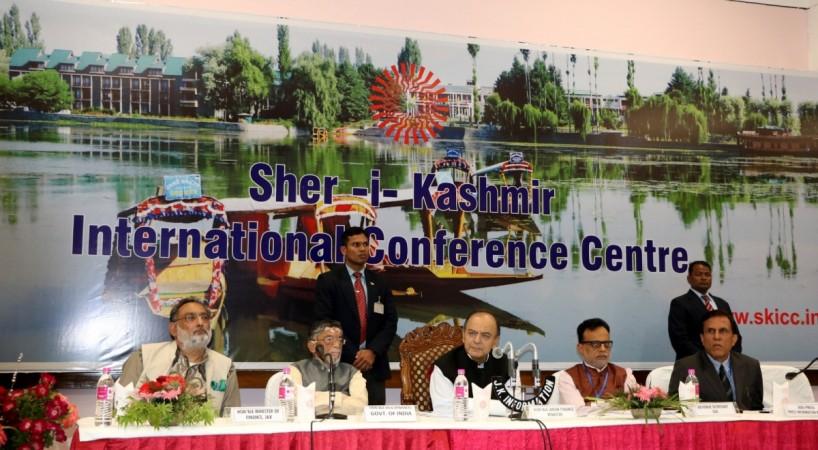 Finance Minister Arun Jaitley addresses a press conference after the first day of the GST Council meet.at Sher-e-Kashmir International Convention Centre (SKICC) in Srinagar on May 18, 2017. gst rates, gst rate finalisation, gst on cars, gst on food items, gst exempt on, gst on services, arun jaitley, gst council meeting at srinagar
