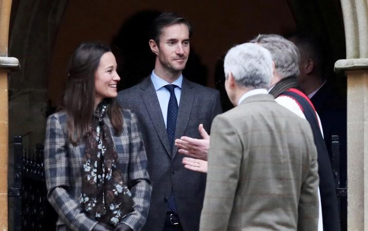 Pippa Middleton (L), her fiance James Matthews (C) and her father Michael Middleton (back to camera) leave after attending the morning Christmas Day service at St Mark's Church in Englefield, near Bucklebury in southern England. Pippa Middleton wedding