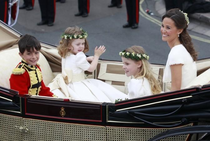 (L to R) Pageboy Billy Lowther-Pinkerton, bridesmaids Grace van Cutsem, Margarita Armstrong-Jones and Maid of Honour Pippa Middleton travel to Buckingham Palace after the wedding of Prince William and Catherine, Duchess of Cambridge. Pippa Middleton