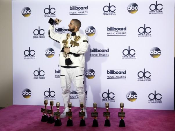 Drake posing with all his 13 awards after the Billboard Music Awards 2017 Drake at Billboard Music Awards 2017