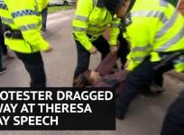 Fox hunting protester dragged along ground by police at Theresa May speech