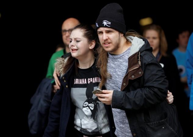 In picture: People rush out of the Arndale shopping centre as it is evacuated in Manchester, Britain May 23, 2017. Manchester
