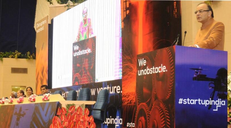 Arun Jaitley addressing the opening session of launch of the Start Up India, in New Delhi on January 16, 2016. Minister of State for Commerce & Industry (Independent Charge) Nirmala Sitharaman and other dignitaries are also seen. ravi shankar prasad, ministry of electronics and it, modi govt, it jobs, it layoffs, wipro, infosys, nasscom, it job creation, it hiring