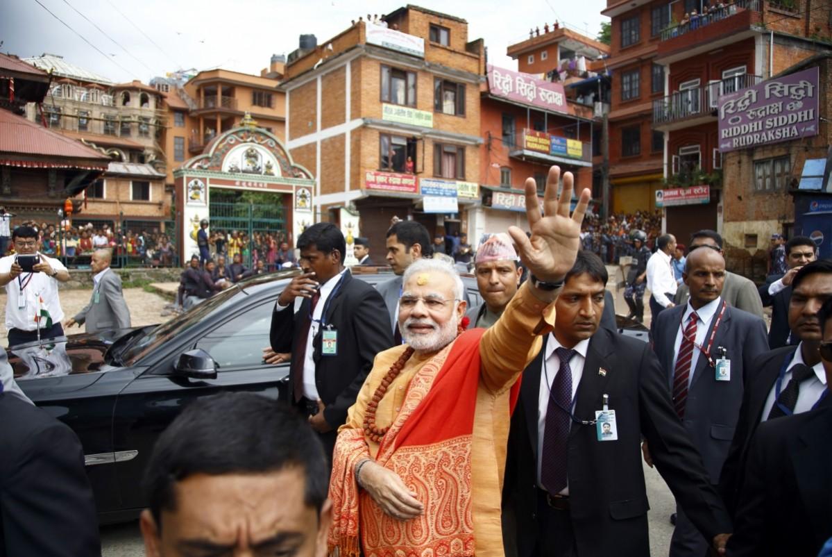 Narendra Modi waves out to the crown in Nepal Narendra Modi