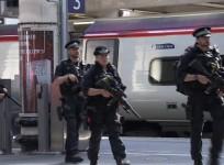 Armed police patrol major U.K. train stations after terror attack