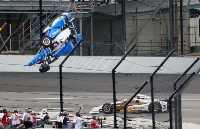 Scott Dixon's car goes up in the air after the accident. Scott Dixon, Indy 500, Scott Dixon crash