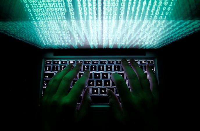 A man types on a computer keyboard in this illustration picture taken February 28, 2013. A man types on a computer keyboard in this illustration picture taken February 28, 2013
