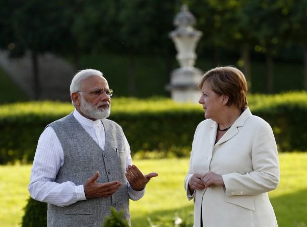 Indian Prime Minister Narendra Modi talks to German Chancellor Angela Merkel during their meeting at the German government guesthouse Meseberg Palace in Meseberg, Germany, May 29, 2017. Modi Merkel