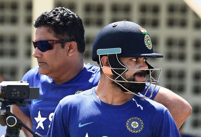 Ahaaa....Anil Kumble and Virat Kohli are looking at the opposite direction. Anil Kumble, Virat Kohli, India Cricket, India coach, Champions Trophy 2017