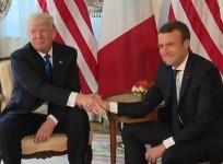 Macron-Trump handshake under scrutiny as pair meet for first time