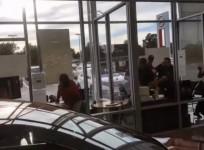 Deadly shootout captured on camera in car dealership