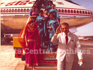 J R D Tata with the crew in front of one of the first Jumbo aircraft ordered by Air India in this undated photo. air india loss profit operating seats revenues cost pilot civil aviation market share domestic traffic air air spicjet competition fastest growing economy