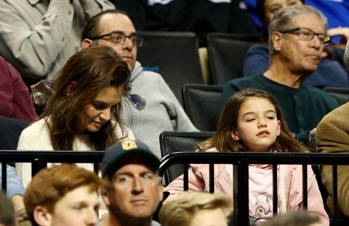Actress Katie Homes with daughter Suri Cruise