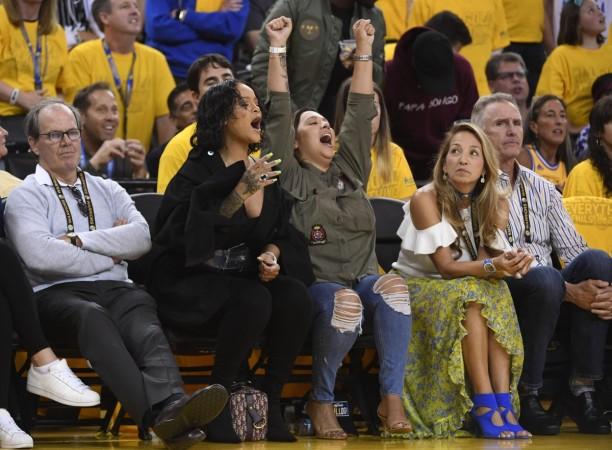 Rihanna in attendance in the first half of the 2017 NBA Finals between the Golden State Warriors and the Cleveland Cavaliers at Oracle Arena. Rihanna
