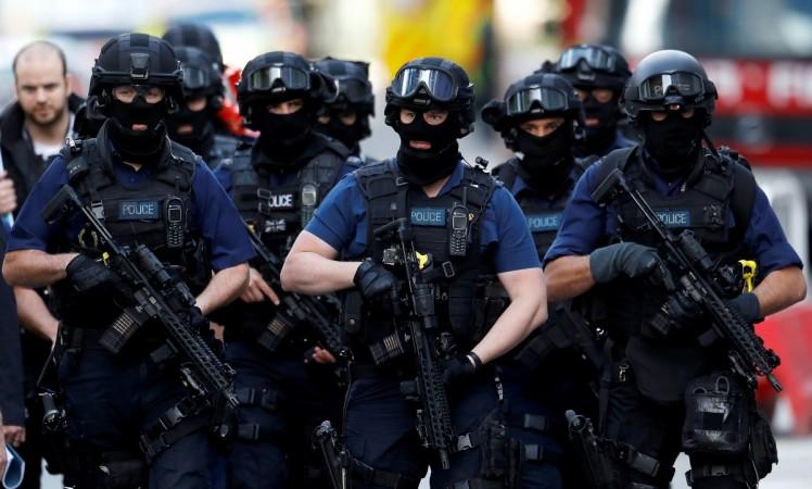 Armed police officers walk near Borough Market after the attack on June 4 Armed police officers walk near Borough Market after the attack