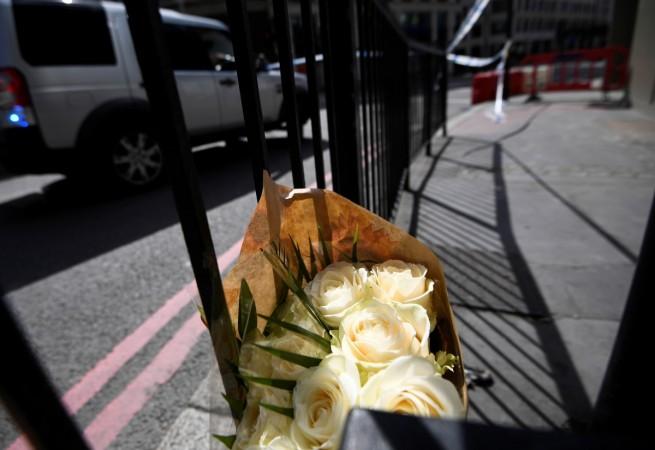 A bunch of flowers is left near London Bridge after an attack left 7 people dead and dozens injured in London
