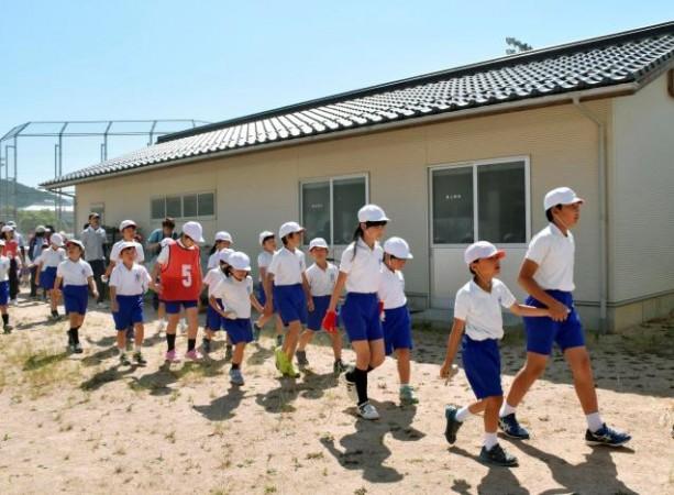 School students participate in an evacuation drill in Japan Japan evacuation drill