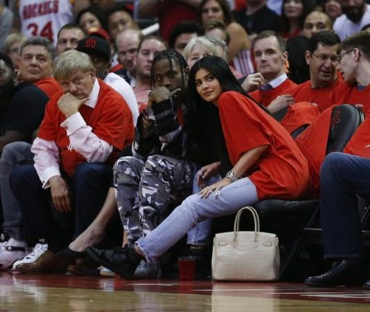 Houston rapper Travis Scott and Kylie Jenner watch courtside during Game Five of the Western Conference Quarterfinals game of the 2017 NBA Playoffs at Toyota Center Travis Scott and Kylie Jenner