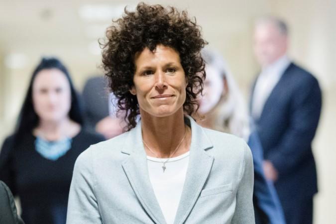 Andrea Constand walks to the courtroom during Bill Cosby's sexual assault trial at the Montgomery County Courthouse in Norristown, Pennsylvania. Andrea Constand