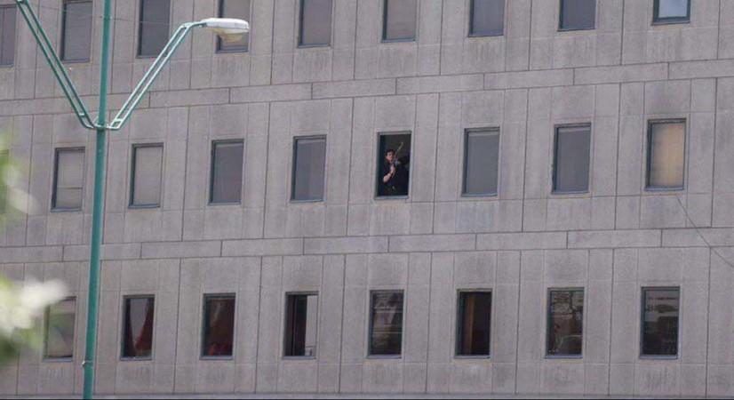 An attacker can be seen inside the Iran Parliament building. Parliament attack